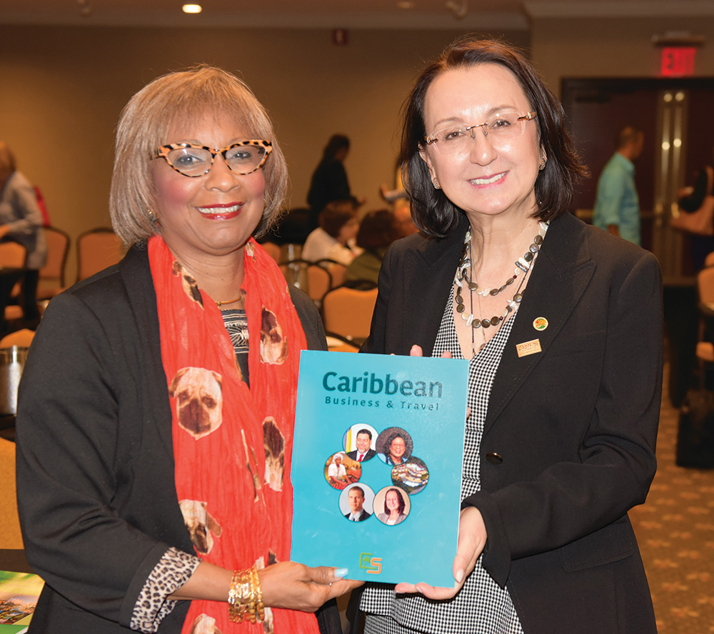 Gail-with-CHTA-President Gail displays the first edition of our business magazine to then President of the Caribbean Hotel and Tourism Association (CHTA) Karolin Troubetzkoy.
