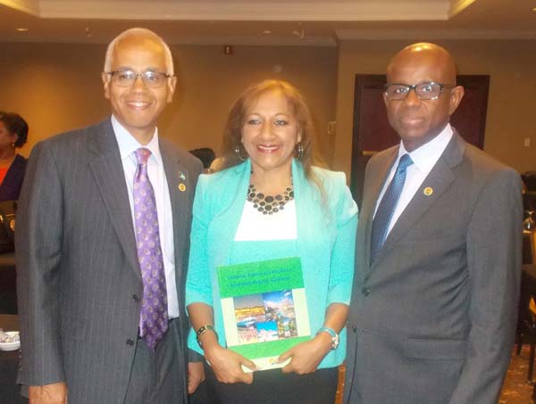 Editor of the Investment Guide, Sandra Ann Baptiste, proudly displays the publication. She is flanked by the CTO Chairman, Bahamas Minister of Tourism and Aviation, Dionisio D’ Aguilar (at left) and Secretary General Hugh Riley.